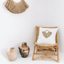 Load image into Gallery viewer, Cream boho cushion on beautiful boho styled bed. Cream cushion with seagrass cushion accessory.
