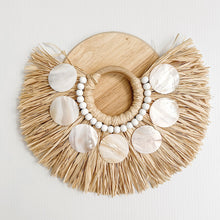 Load image into Gallery viewer, Cushion with shell and raffia accent piece. Perfect for coastal decorating in your coastal home. Shell and raffia cushion accessory.
