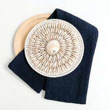 Load image into Gallery viewer, White coastal cushion with a rattan and shell disk, the perfect beach pillows for your coastal home. Shell rattan cushion accessory

